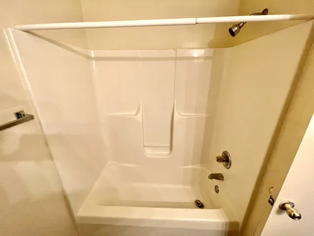 a bathroom with a bathtub