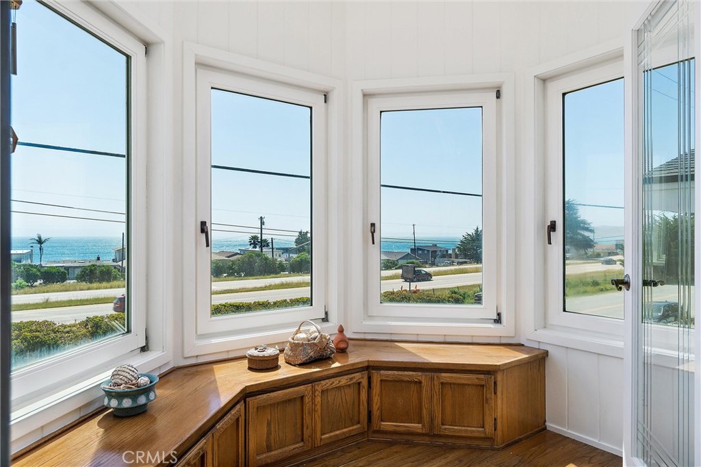 a bathroom with a tub sink and window