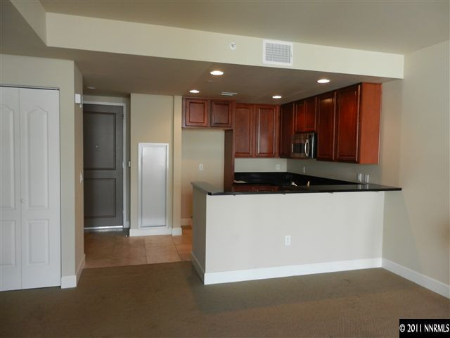 50 North Sierra Street, Unit 605 Reno, NV 89501 - Photo 10 of 11 a view of a kitchen with a sink and dishwasher