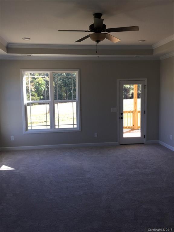 1854 State Rd S-46-168, Unit 4 York, SC 29745 - Photo 17 of 20 a view of a livingroom with a ceiling fan and window