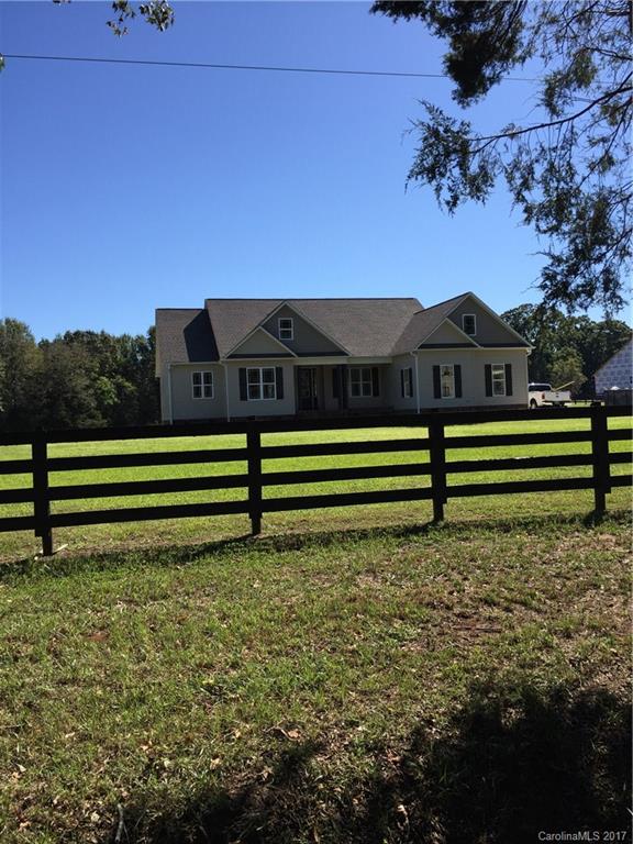 1854 State Rd S-46-168, Unit 4 York, SC 29745 - Photo 5 of 20 a view of a yard in front of a house