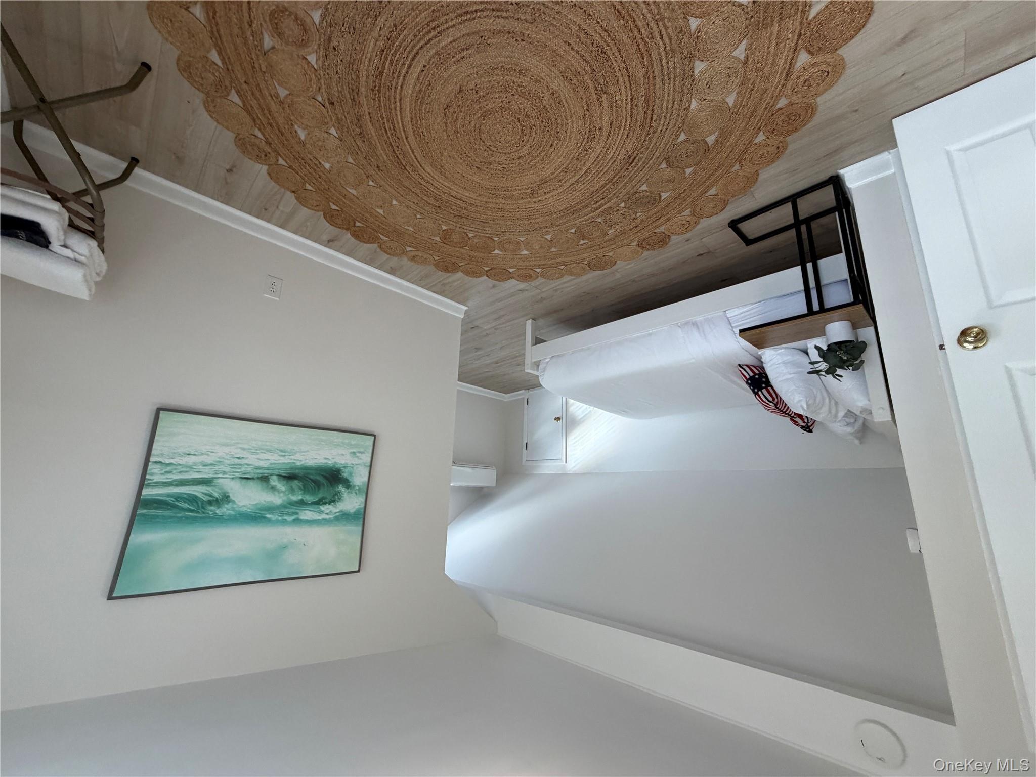 380 Eds Road Southold, NY 11971 - Photo 11 of 19 Bedroom featuring light wood-style floors