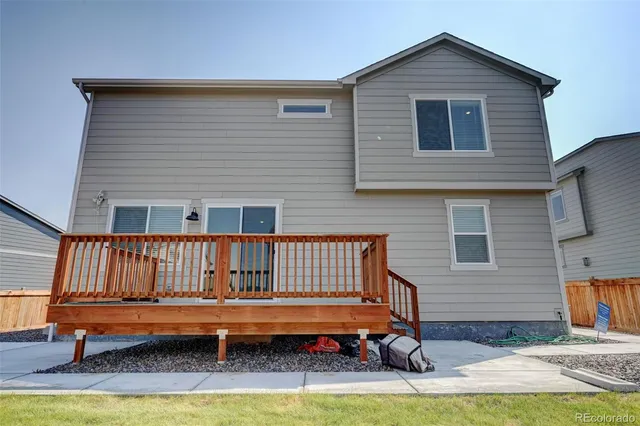 a view of backyard of deck