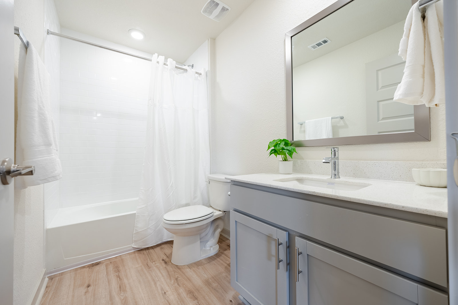 900 Balsora Cove Georgetown, TX 78628 - Photo 24 of 39 A well-appointed bathroom features a contemporary vanity, large mirror, and clean, bright finishes.