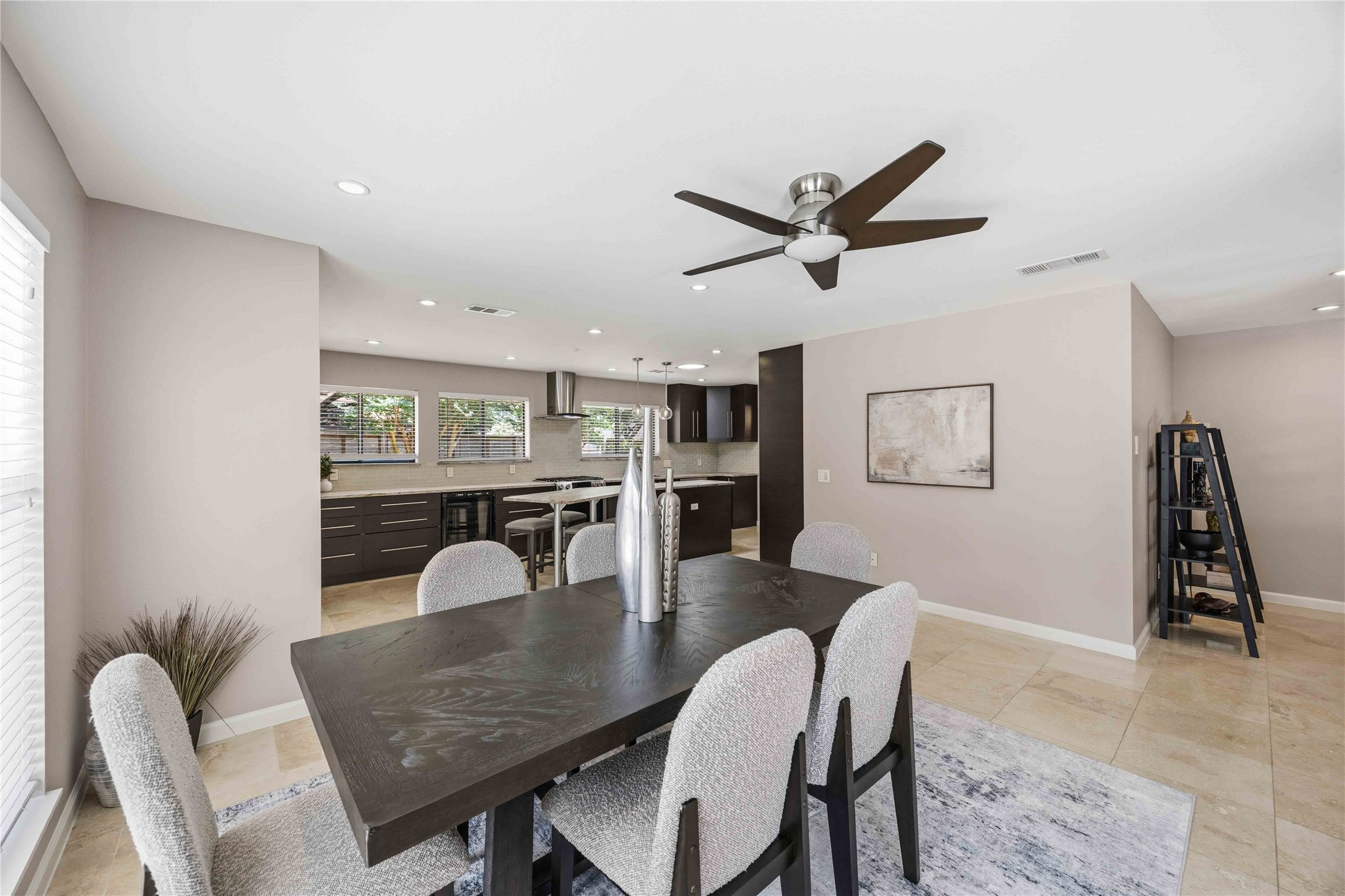 619 Rancho Bauer Drive Houston, TX 77079 - Photo 17 of 46 This versatile open-concept space flows effortlessly into the living room, breakfast area, and gourmet kitchen, offering the flexibility to serve as a formal dining room, an additional family room, or an inviting gathering space tailored to your lifestyle.