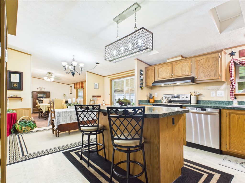 87 Collins Road Lewis Run, PA 16738 - Photo 4 of 48 Eat-in kitchen open to formal dining and living ar