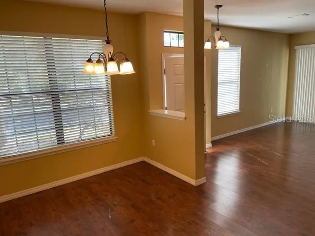 a bathroom with a sink toilet and a mirror