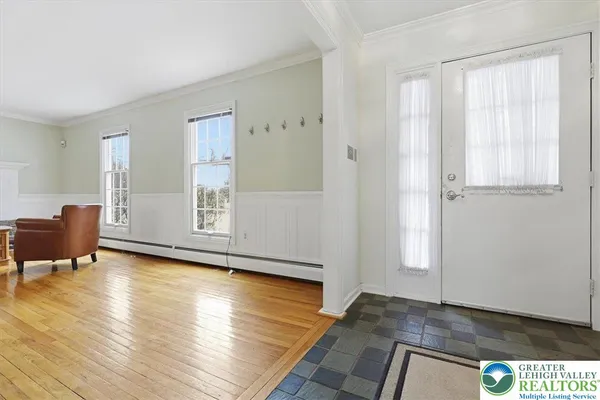 a kitchen with stainless steel appliances granite countertop a stove a refrigerator and a microwave