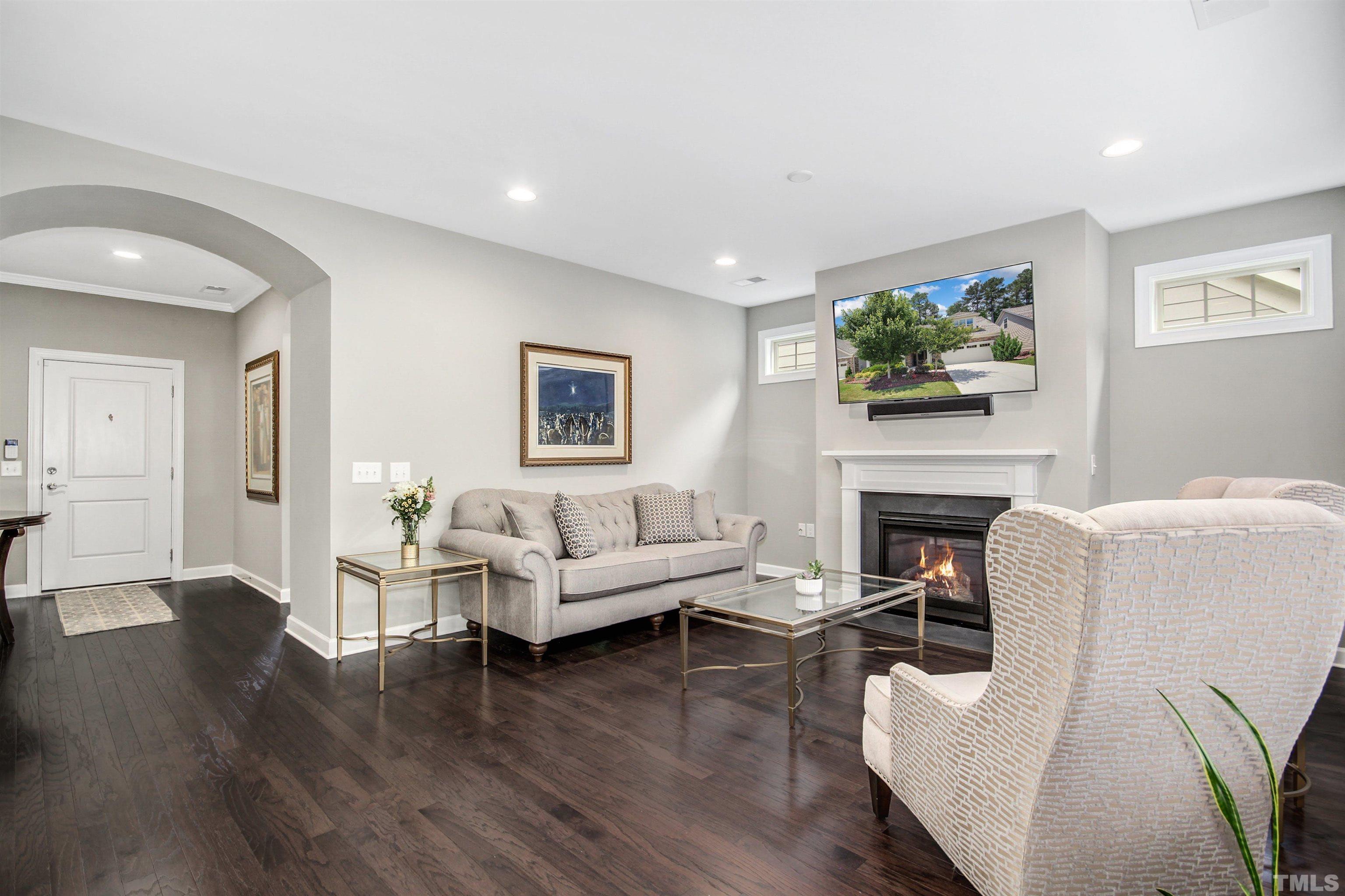 1313 Provision Place Wake Forest, NC 27587 - Photo 11 of 39 a living room with furniture and a fireplace