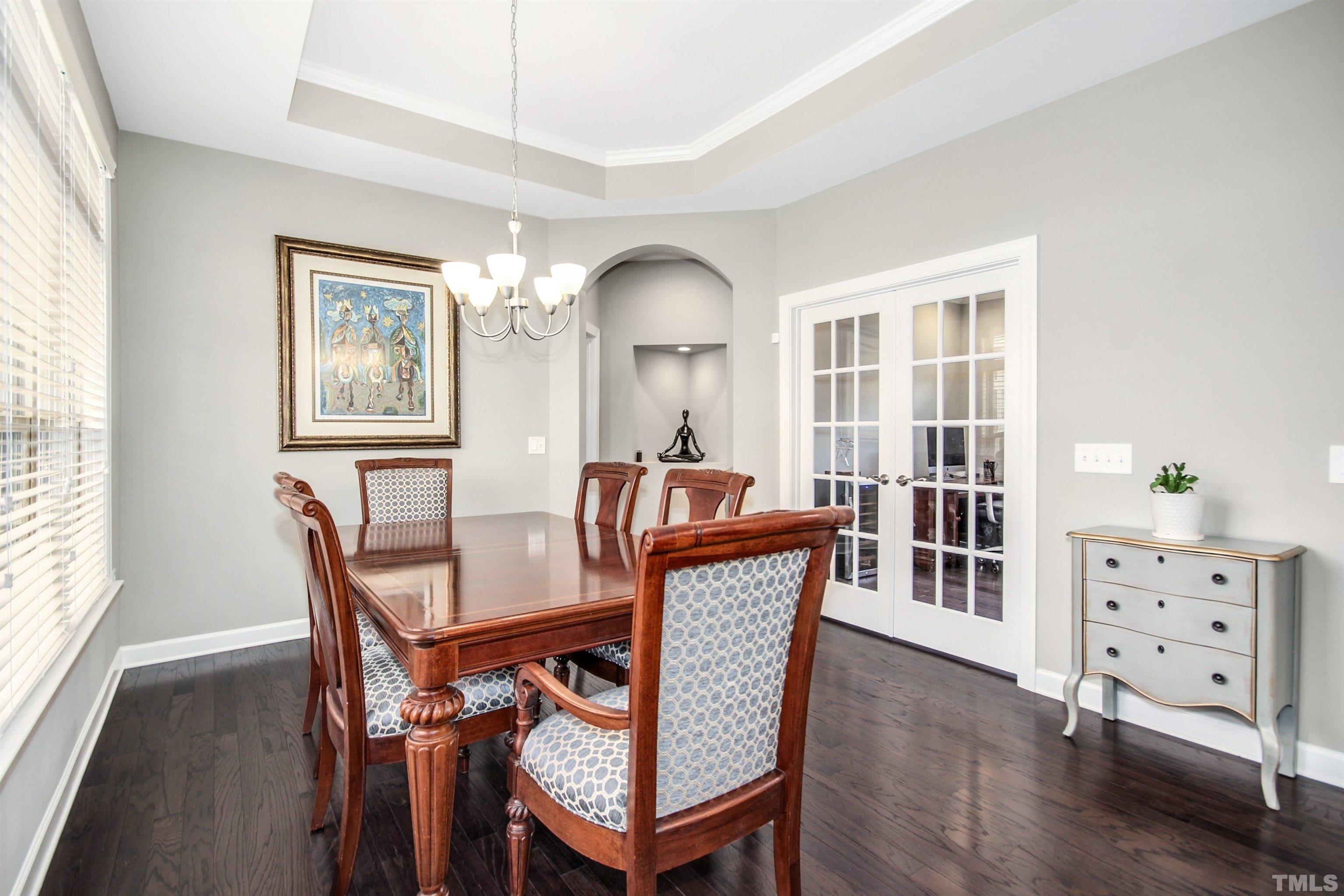 1313 Provision Place Wake Forest, NC 27587 - Photo 17 of 39 a view of a dining room with furniture window and wooden floor