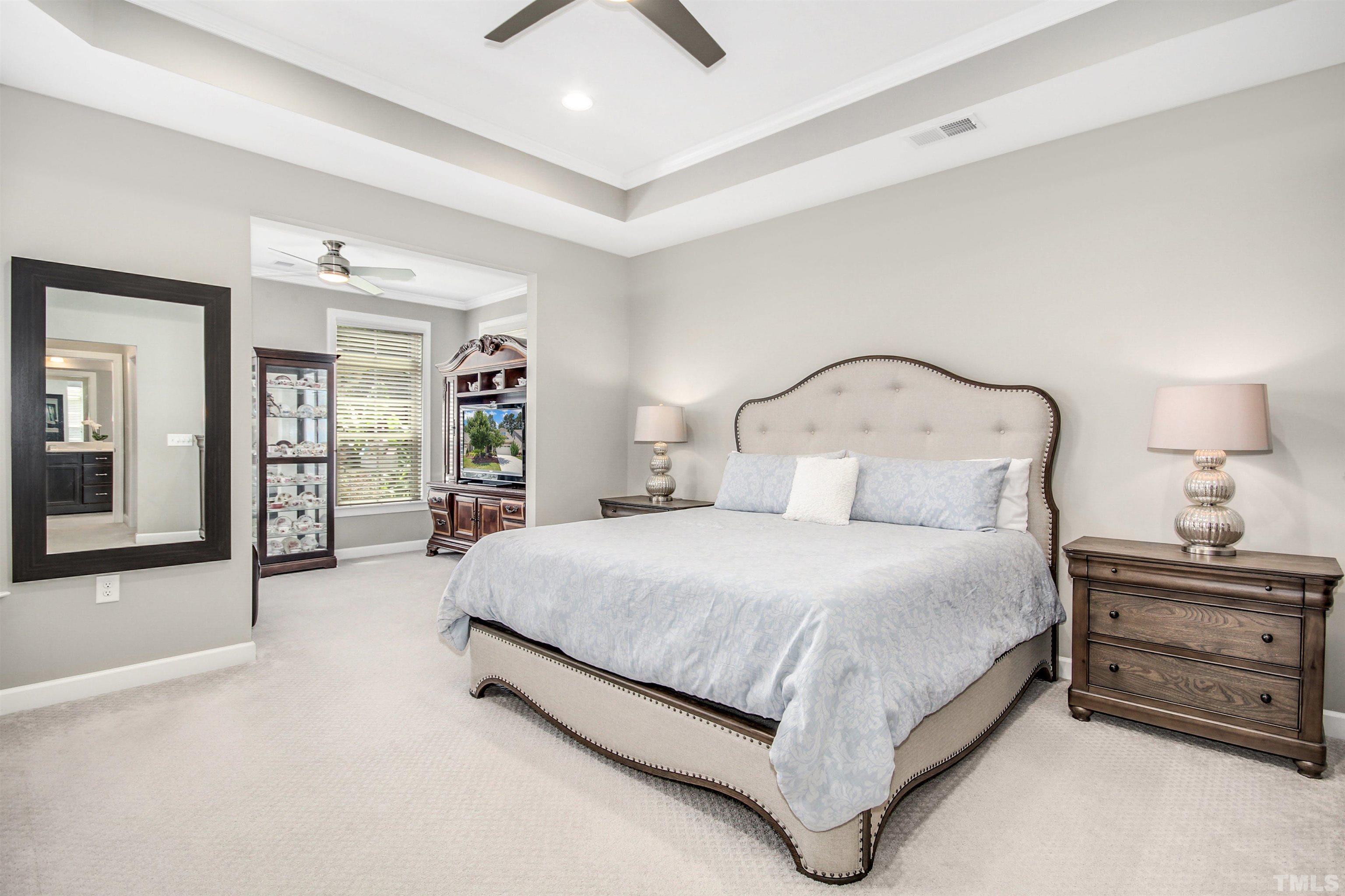 1313 Provision Place Wake Forest, NC 27587 - Photo 21 of 39 a bedroom with a bed and lamp