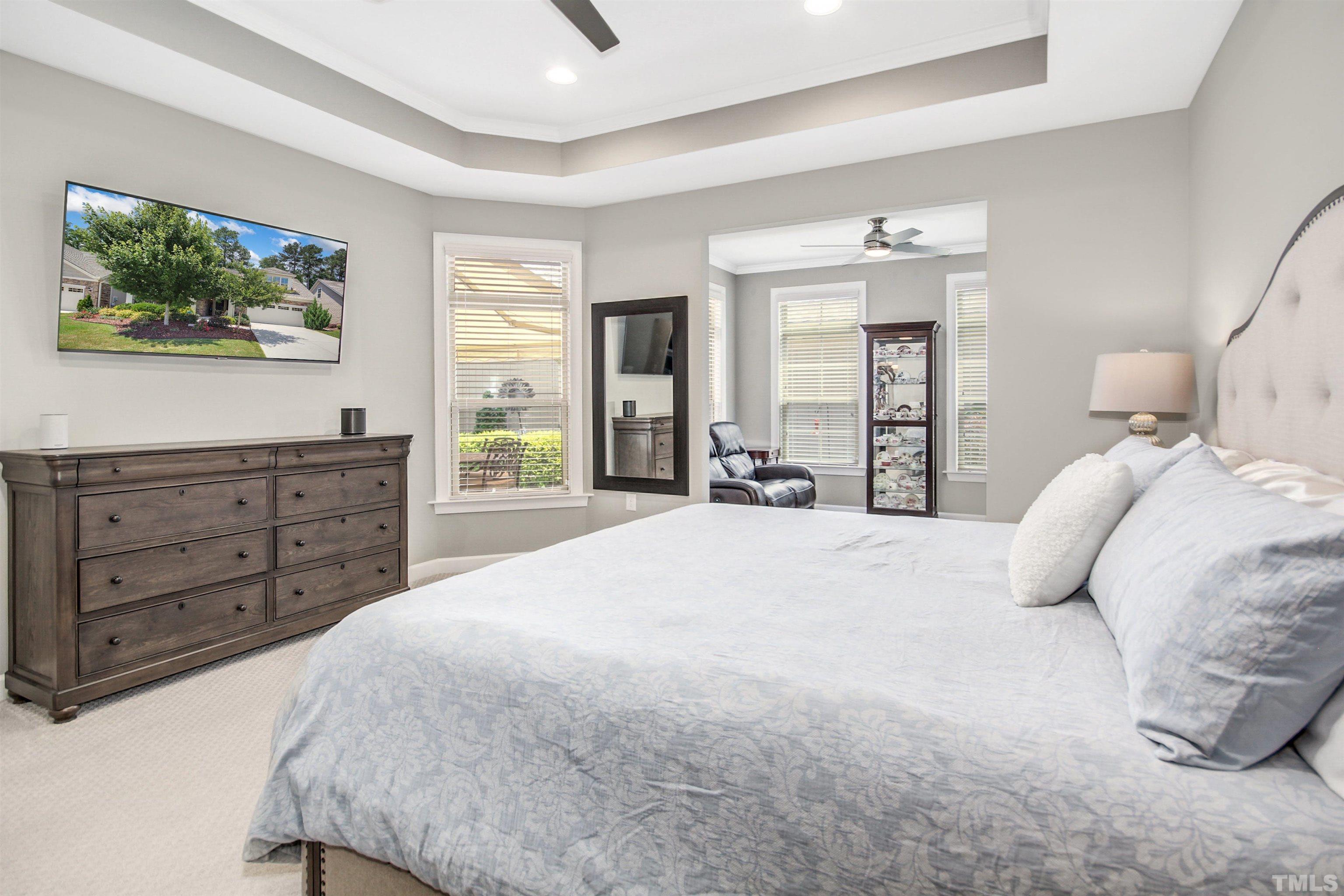1313 Provision Place Wake Forest, NC 27587 - Photo 23 of 39 a bedroom with a large bed and a dresser