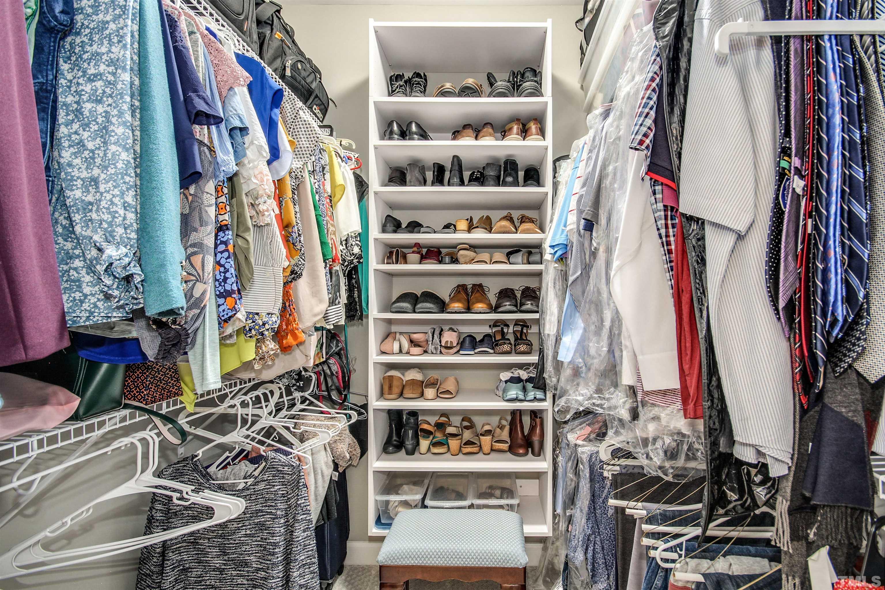 1313 Provision Place Wake Forest, NC 27587 - Photo 25 of 39 a view of walk in closet with clothes and shoes