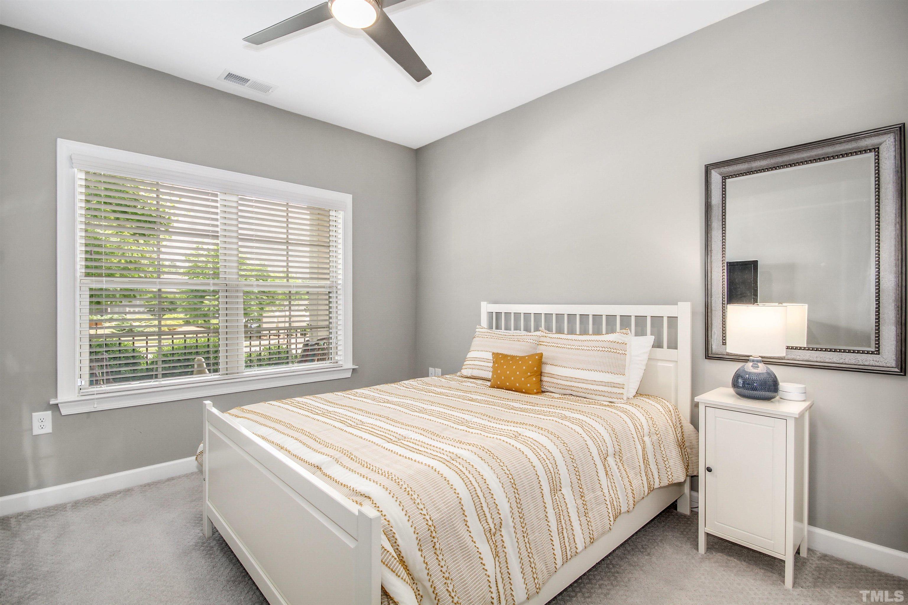 1313 Provision Place Wake Forest, NC 27587 - Photo 28 of 39 a bedroom with bed and window