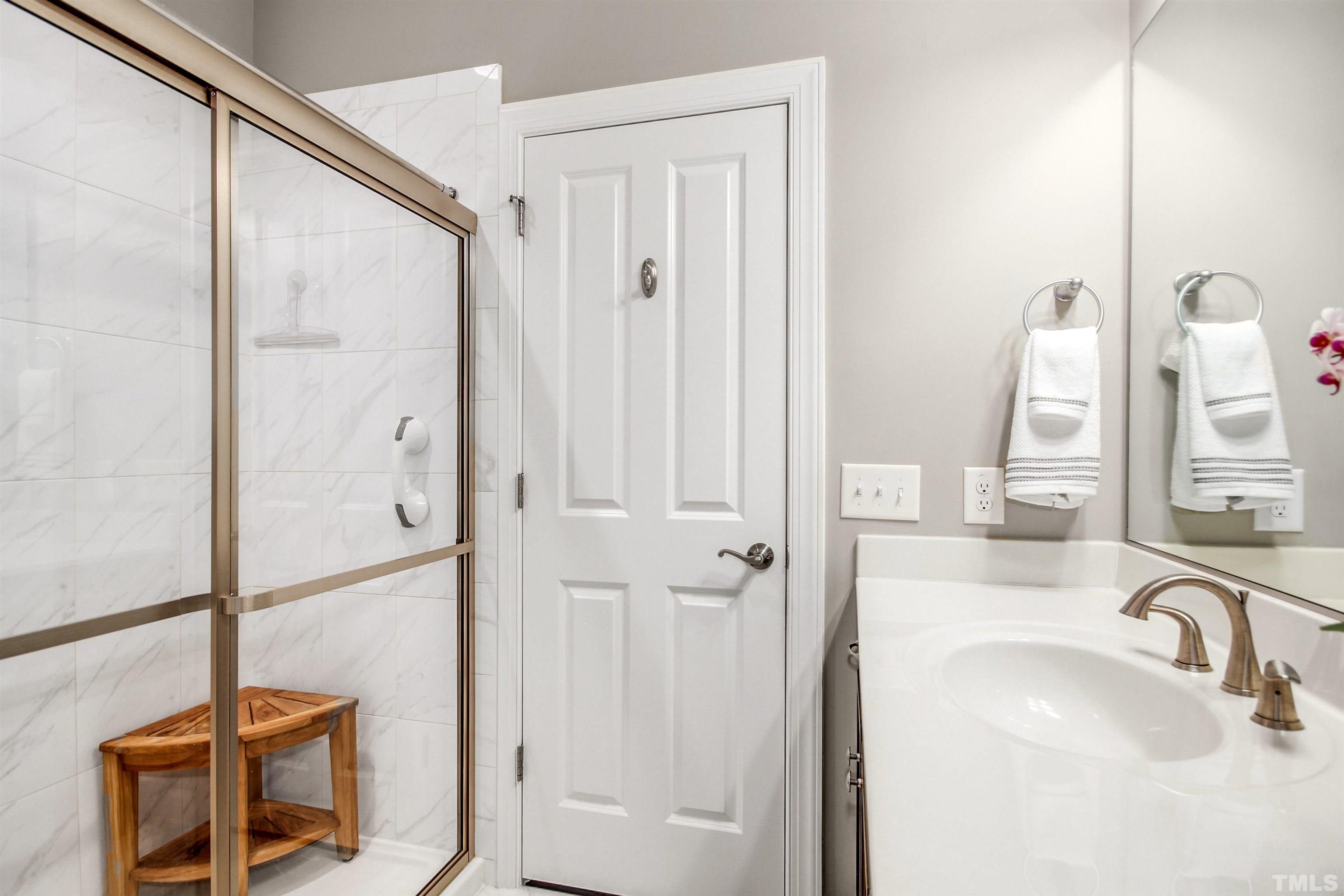 1313 Provision Place Wake Forest, NC 27587 - Photo 29 of 39 a bathroom with a sink and a mirror