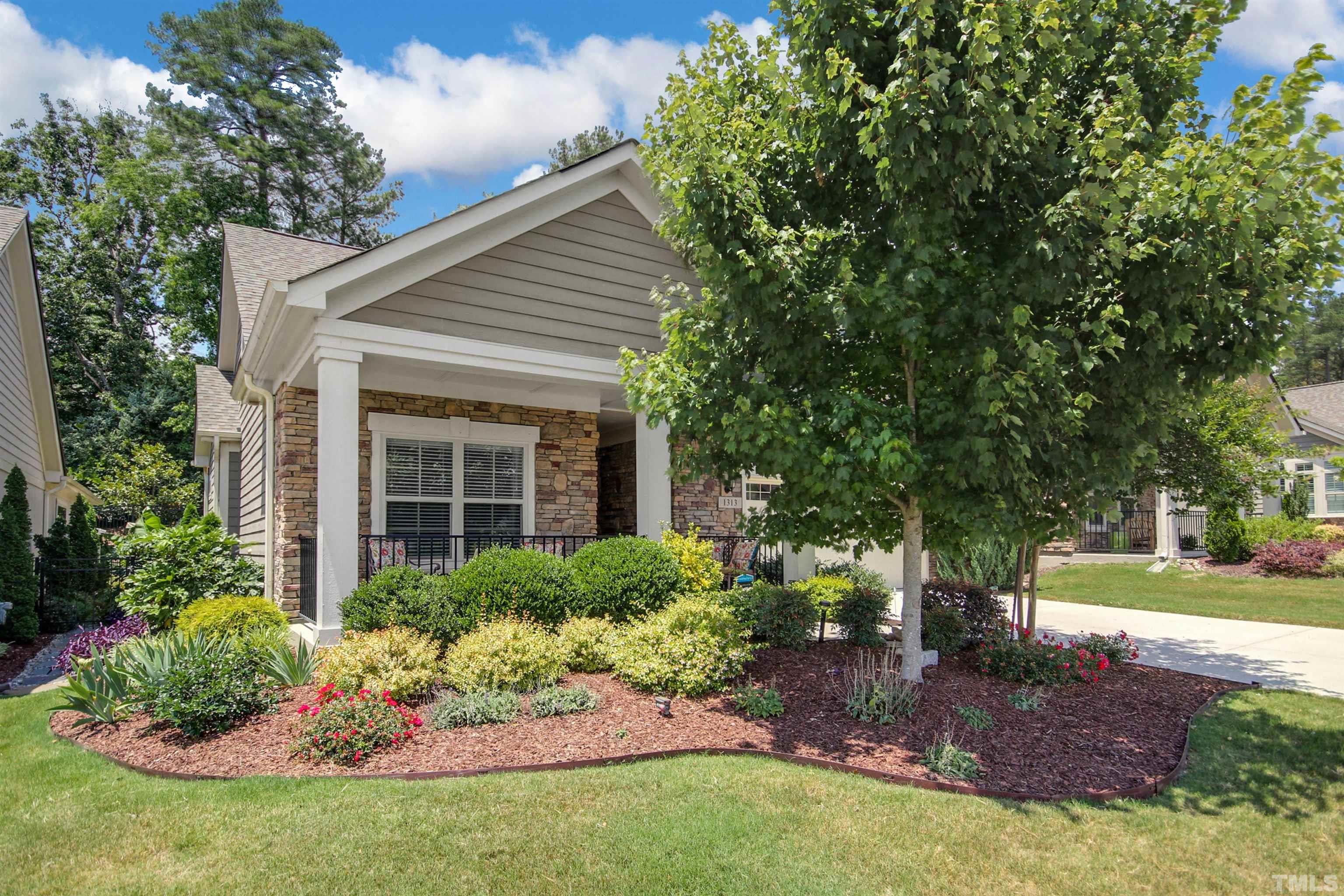 1313 Provision Place Wake Forest, NC 27587 - Photo 3 of 39 front view of a house with a yard