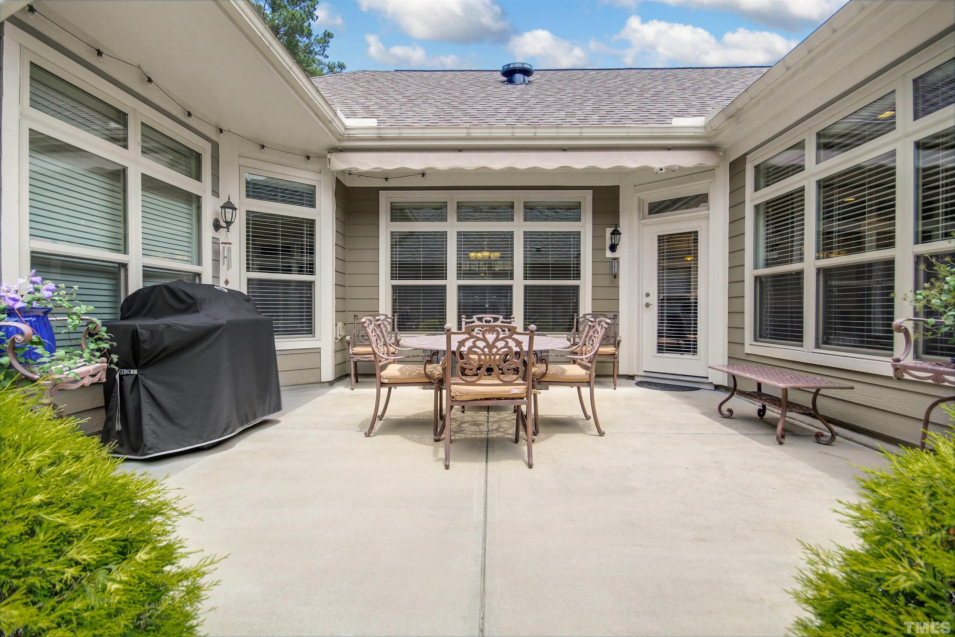 1313 Provision Place Wake Forest, NC 27587 - Photo 33 of 39 a balcony with furniture and potted plants