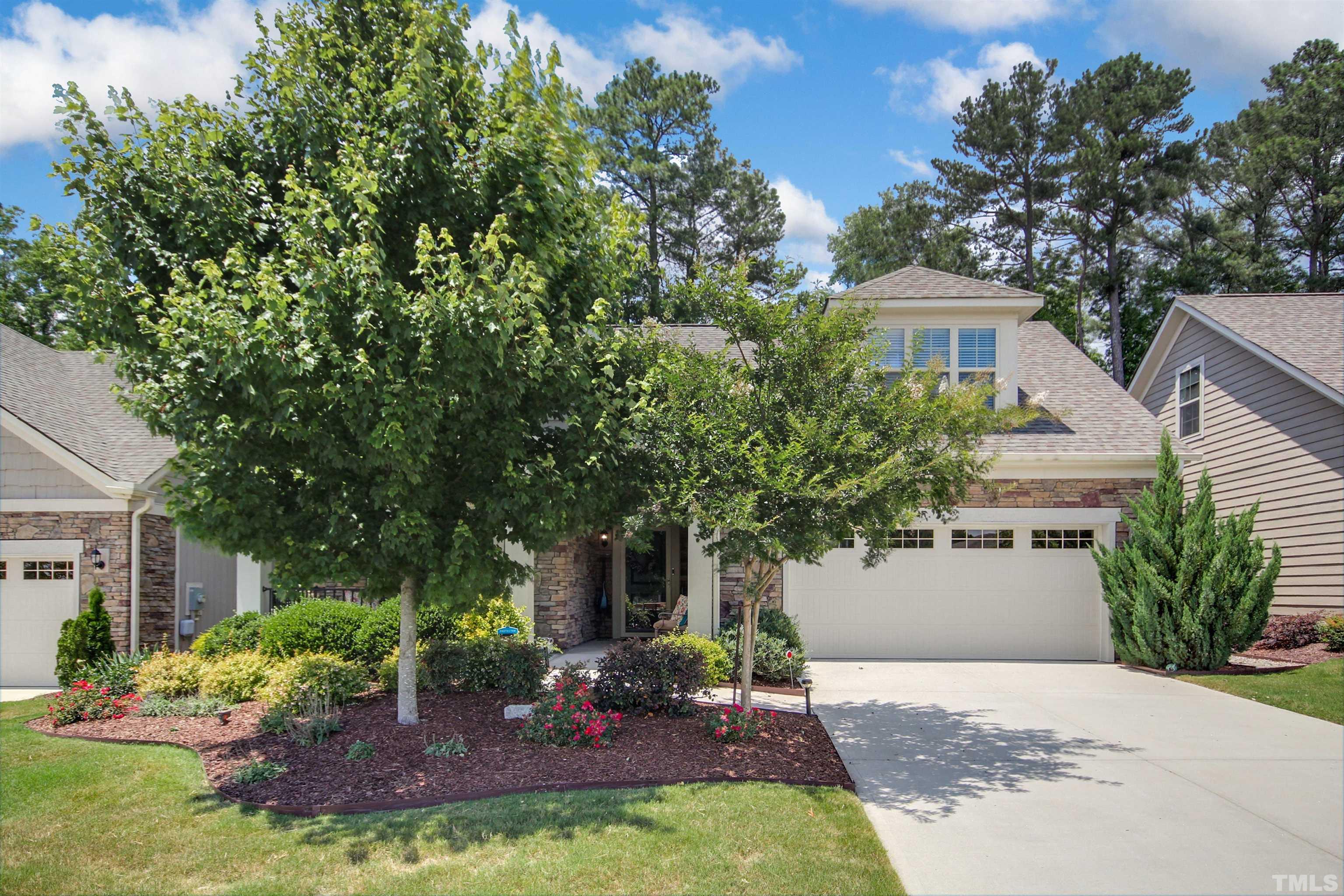 1313 Provision Place Wake Forest, NC 27587 - Photo 5 of 39 a view of a house with a yard and a garden