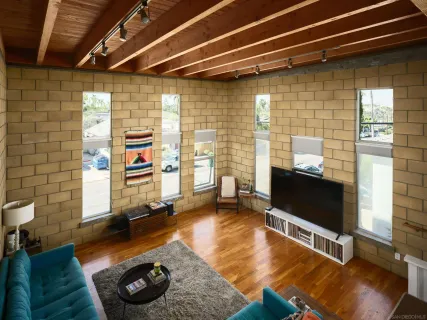 a bedroom with a bed and a shower