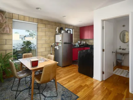 a view of balcony with furniture