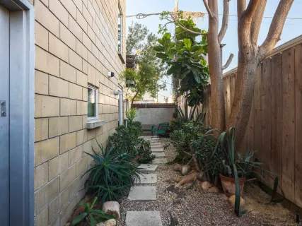 a front view of a building with street view