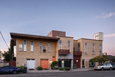 a view of a building with a street