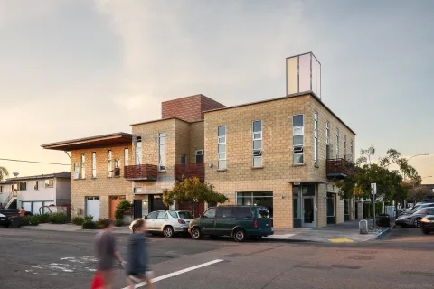 a front view of a building with a street
