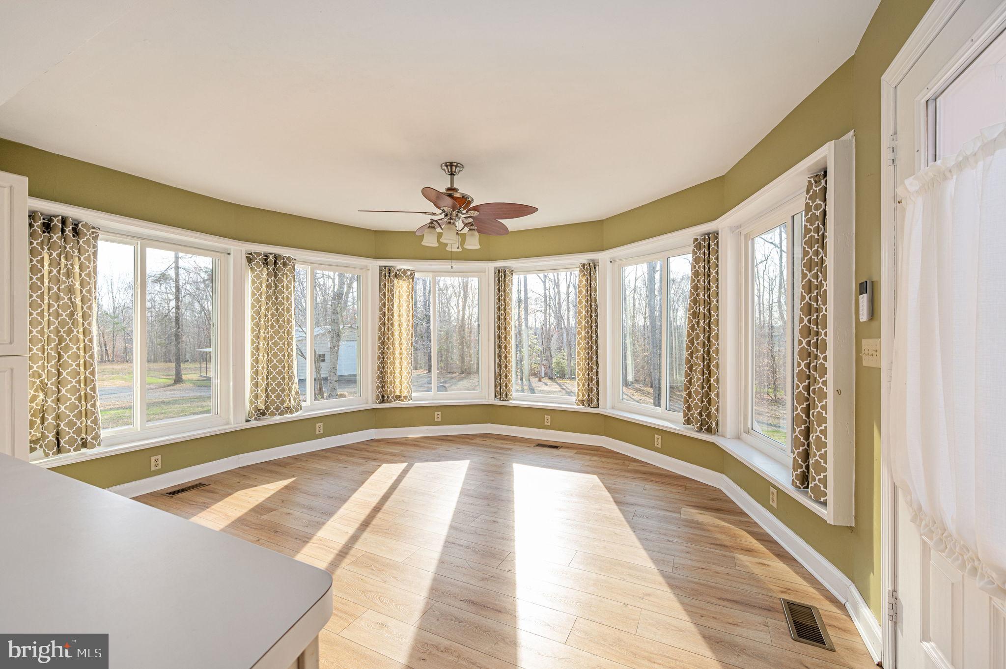 31 River Ridge Lane Fredericksburg, VA 22406 - Photo 15 of 70 a view of a spacious bathroom with a tub and large windows