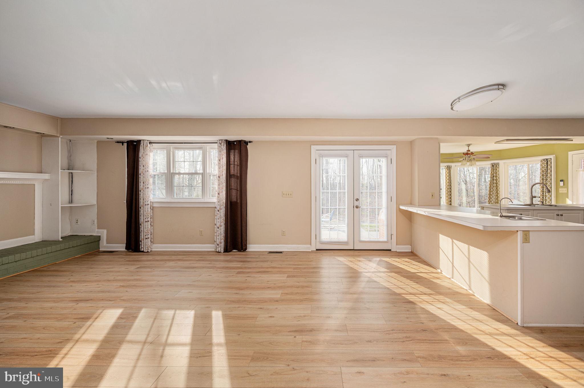 31 River Ridge Lane Fredericksburg, VA 22406 - Photo 20 of 70 a view of an empty room with window and wooden floor