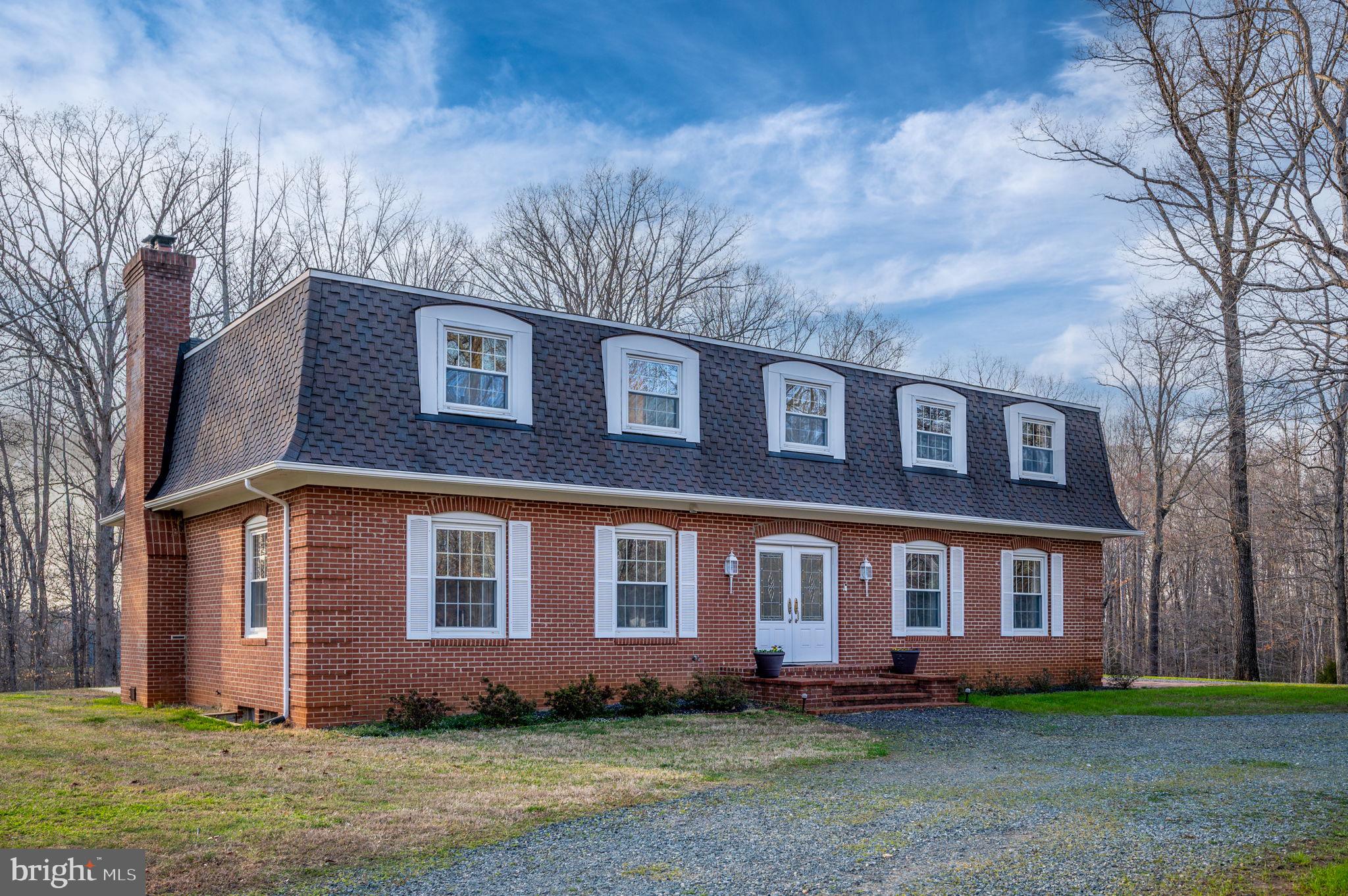 31 River Ridge Lane Fredericksburg, VA 22406 - Photo 2 of 70 a front view of a house with a yard