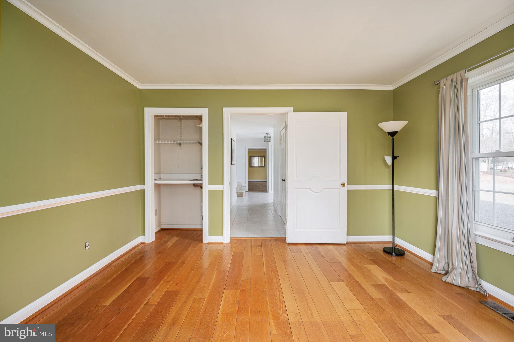 31 River Ridge Lane Fredericksburg, VA 22406 - Photo 22 of 70 a view of empty room with wooden floor and fan