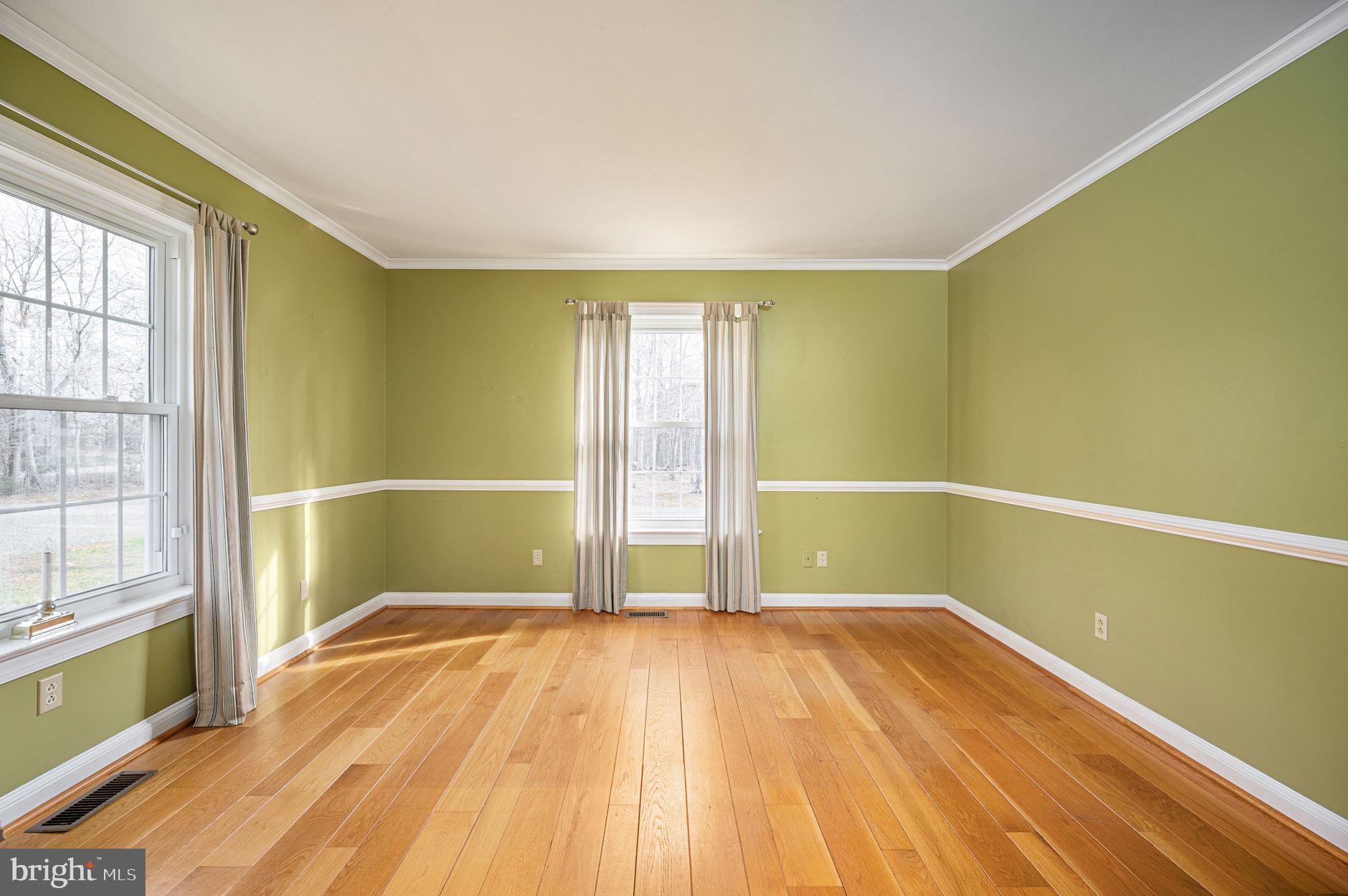31 River Ridge Lane Fredericksburg, VA 22406 - Photo 23 of 70 an empty room with wooden floor and windows