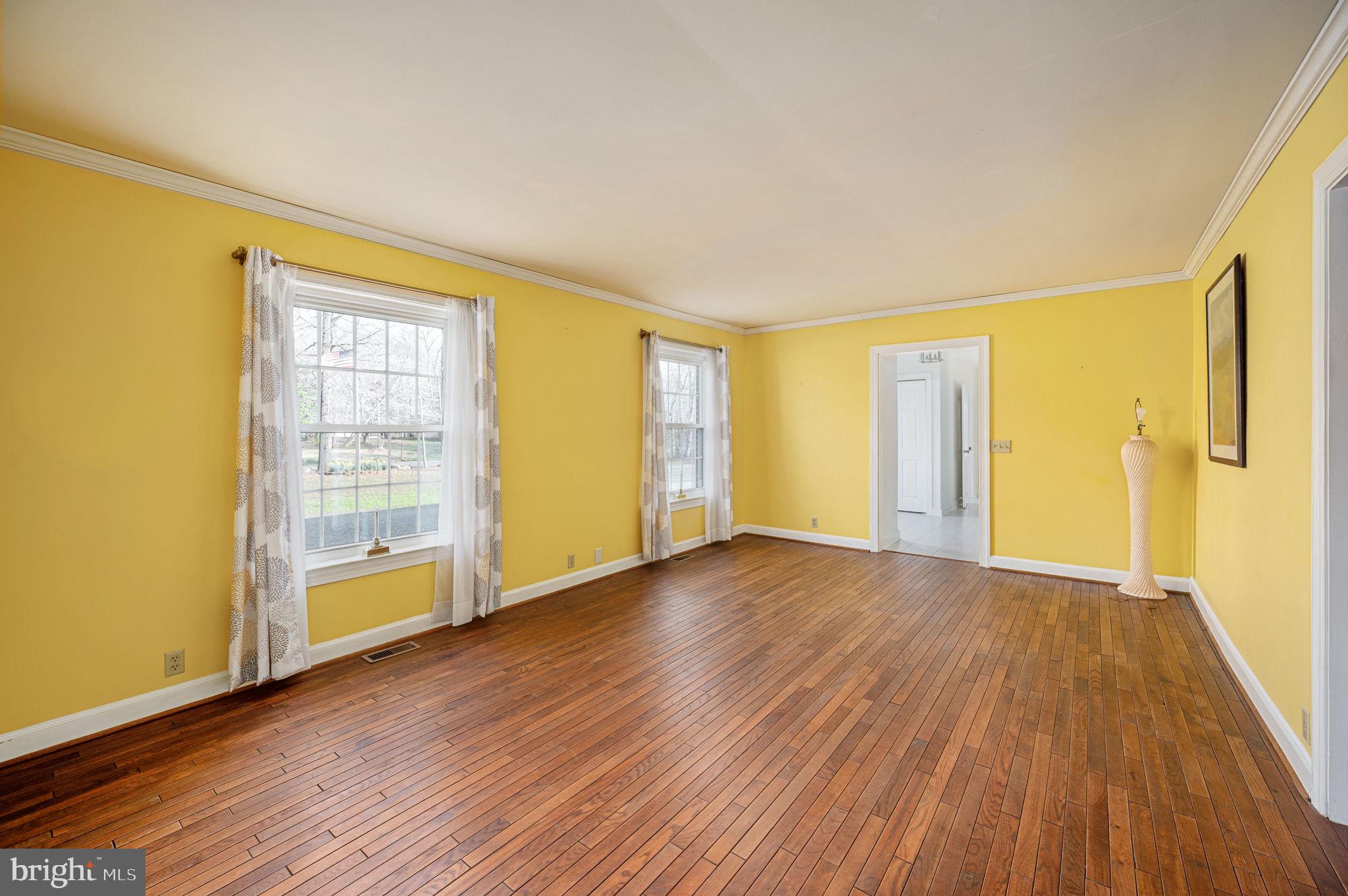 31 River Ridge Lane Fredericksburg, VA 22406 - Photo 28 of 70 a view of an empty room with wooden floor and a window