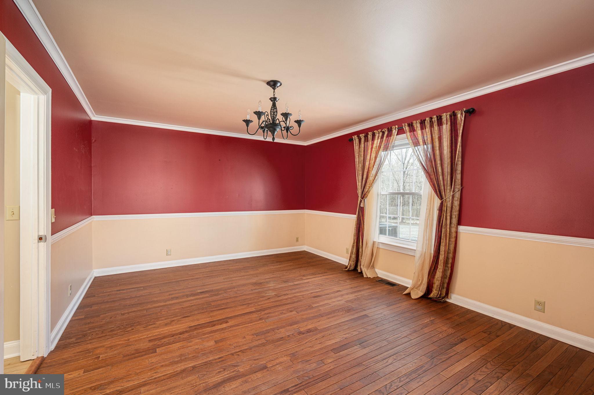 31 River Ridge Lane Fredericksburg, VA 22406 - Photo 30 of 70 a view of empty room with wooden floor and fan