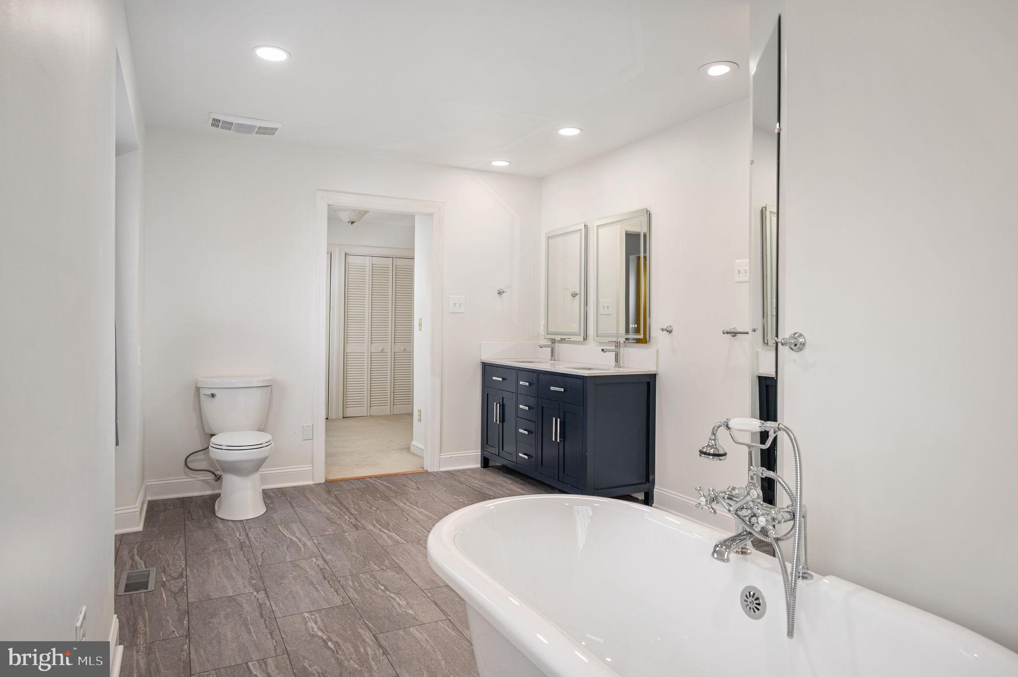 31 River Ridge Lane Fredericksburg, VA 22406 - Photo 39 of 70 a bathroom with a bathtub shower sink and toilet