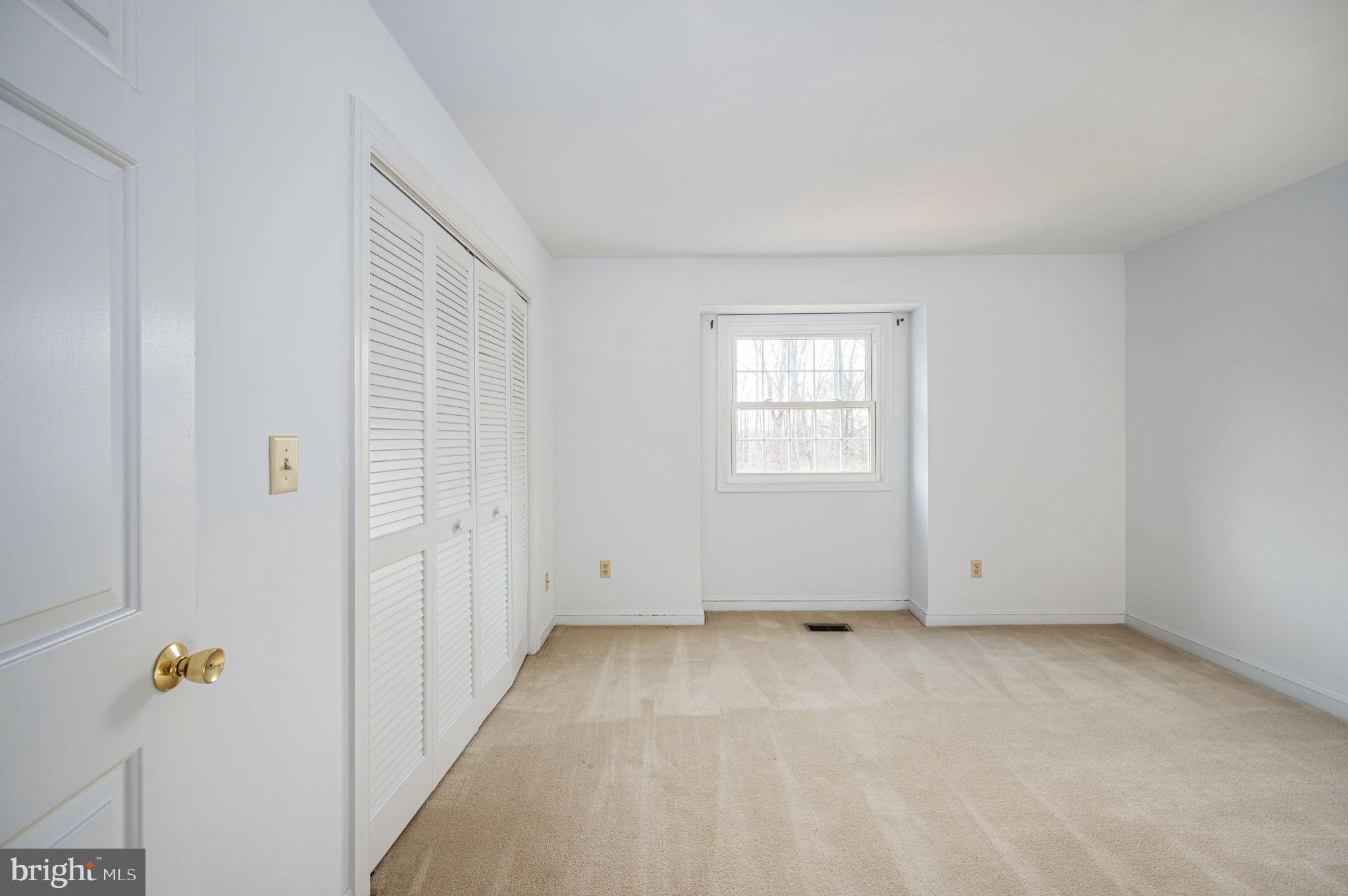 31 River Ridge Lane Fredericksburg, VA 22406 - Photo 54 of 70 an empty room with windows