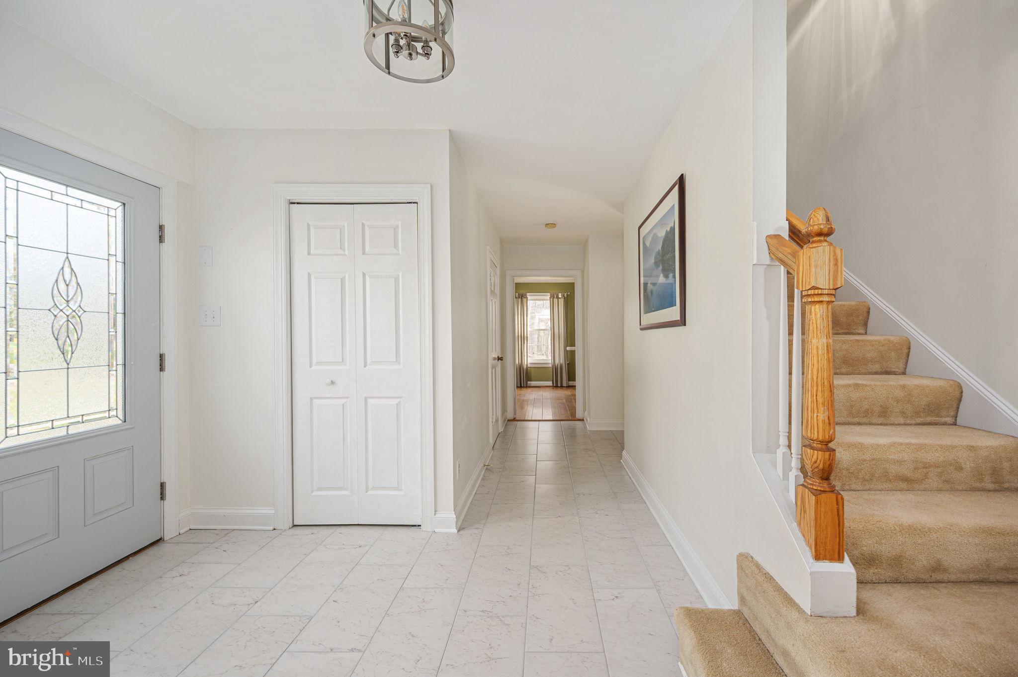 31 River Ridge Lane Fredericksburg, VA 22406 - Photo 6 of 70 a view of a hallway with wooden floor and entryway