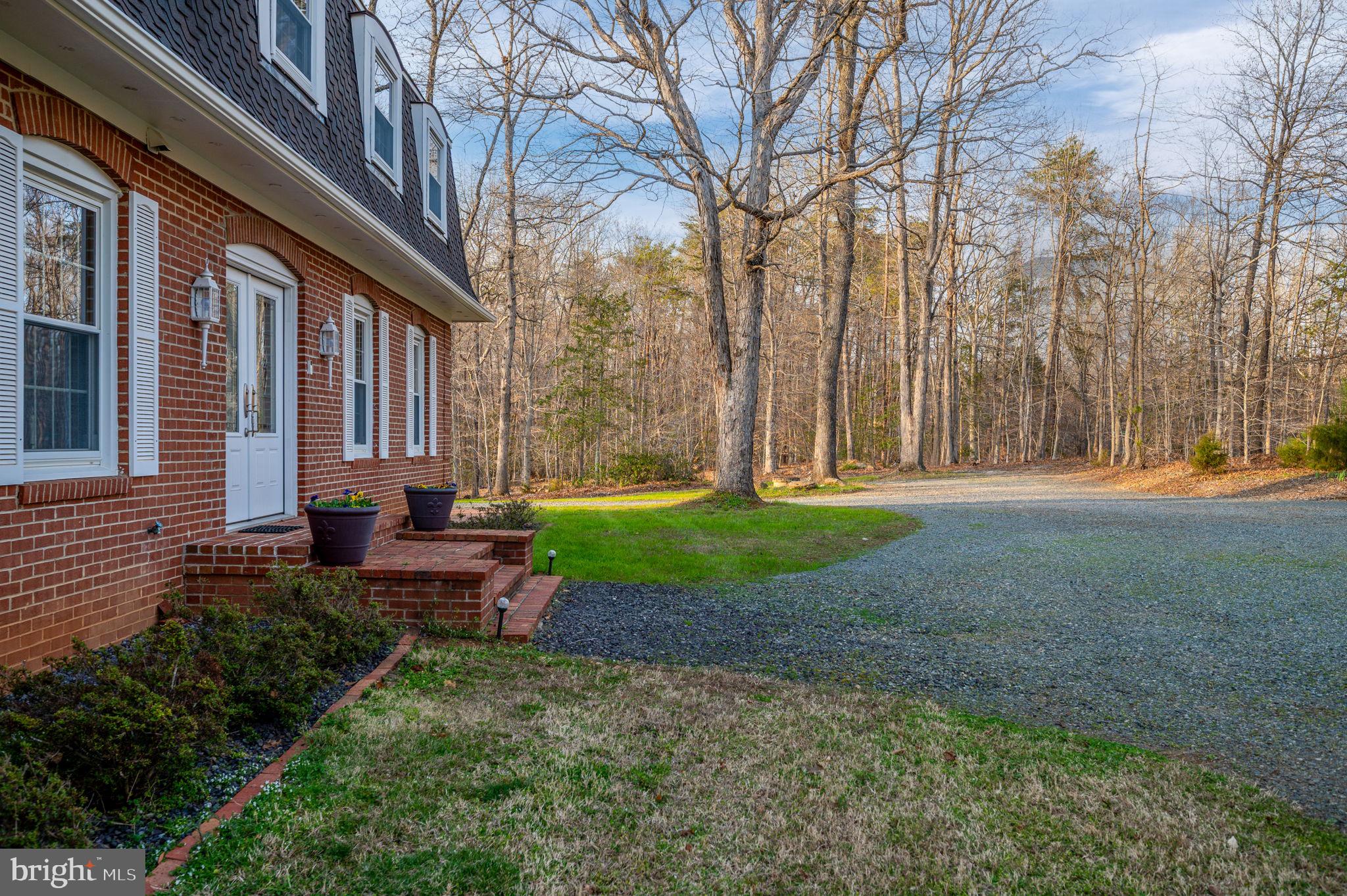 31 River Ridge Lane Fredericksburg, VA 22406 - Photo 64 of 70 a view of a house with backyard and sitting area