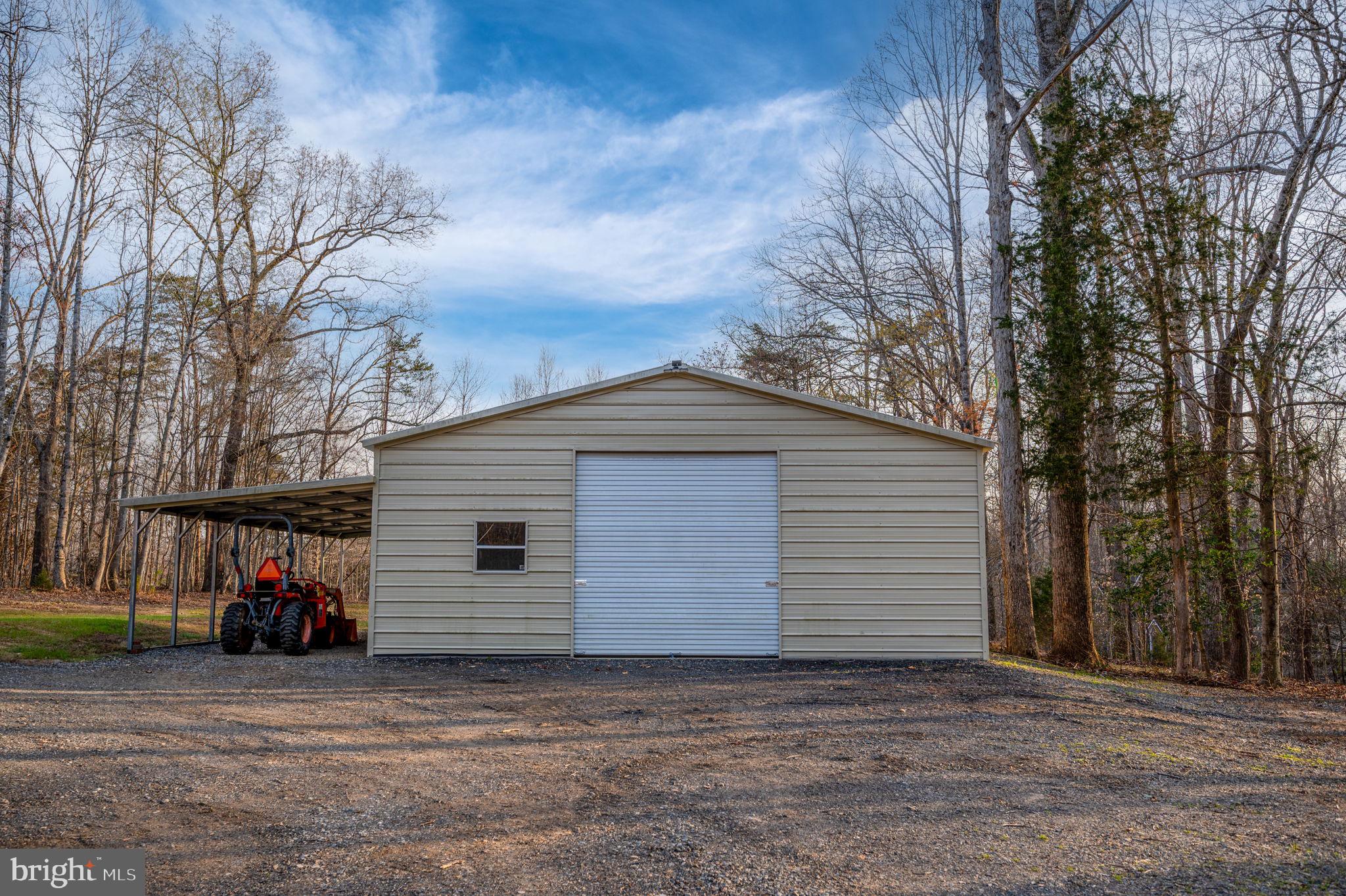 31 River Ridge Lane Fredericksburg, VA 22406 - Photo 67 of 70 a view of a house with a backyard