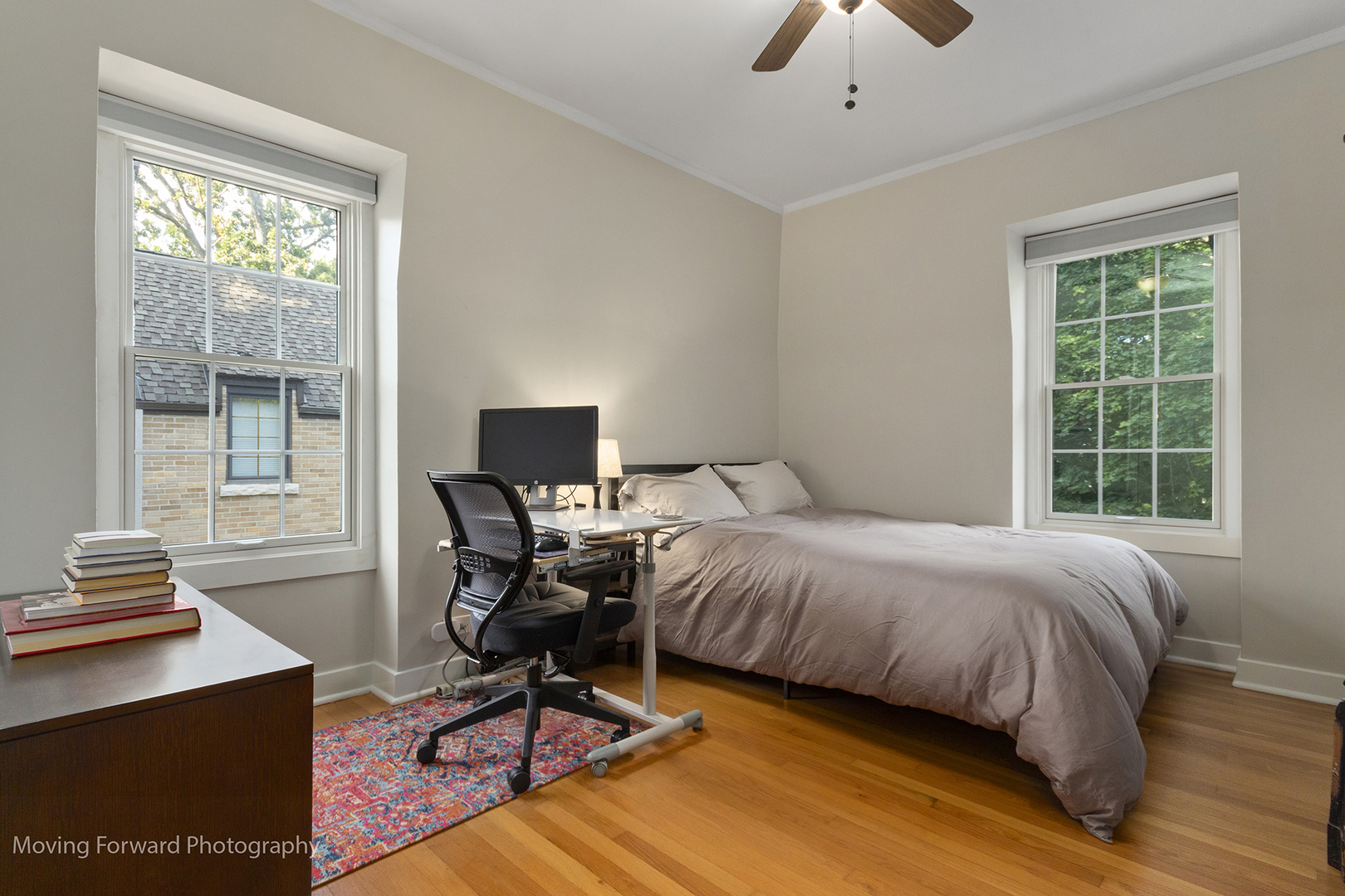 2518 Ridgeway Avenue Evanston, IL 60201 - Photo 12 of 21 a bedroom with a bed and a desk