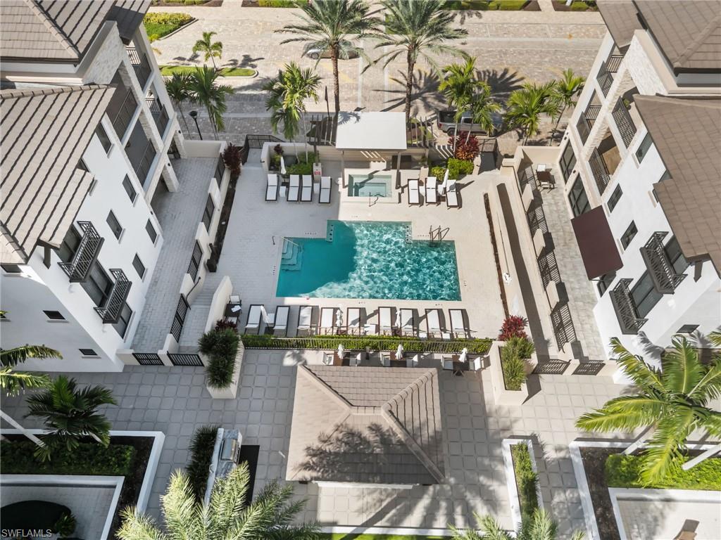 1030 3rd Avenue South, Unit 319 Naples, FL 34102 - Photo 25 of 42 an aerial view of houses with outdoor space