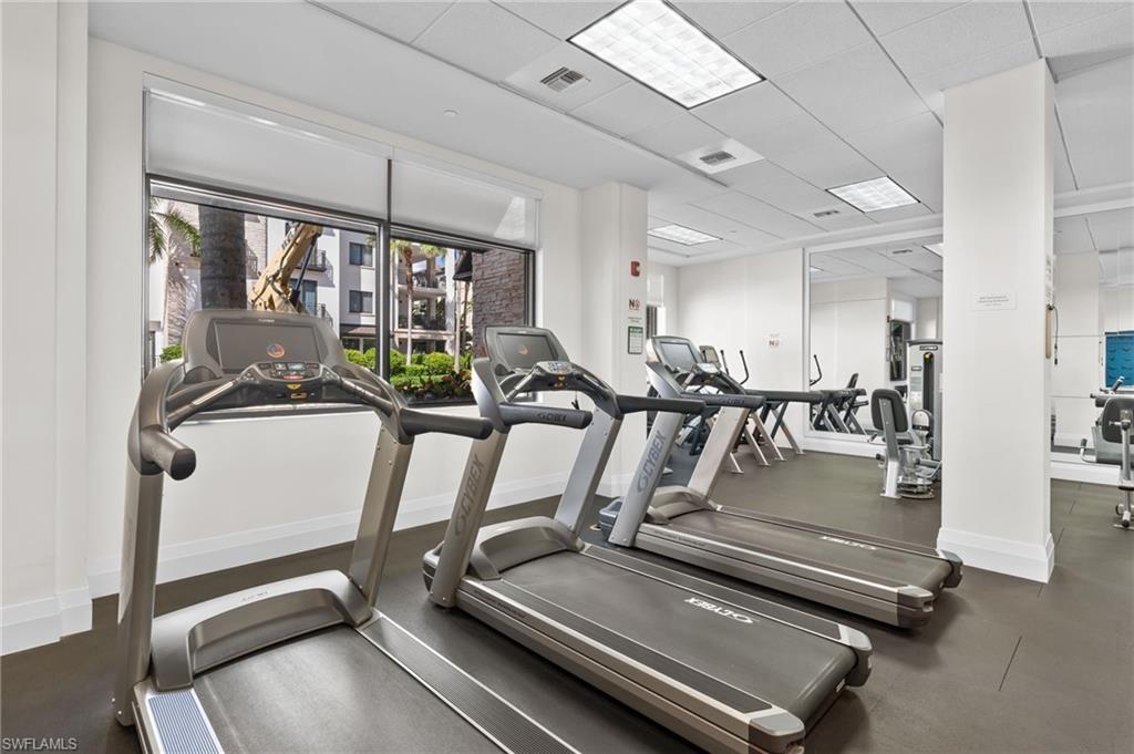 1030 3rd Avenue South, Unit 319 Naples, FL 34102 - Photo 30 of 42 a room with gym equipment