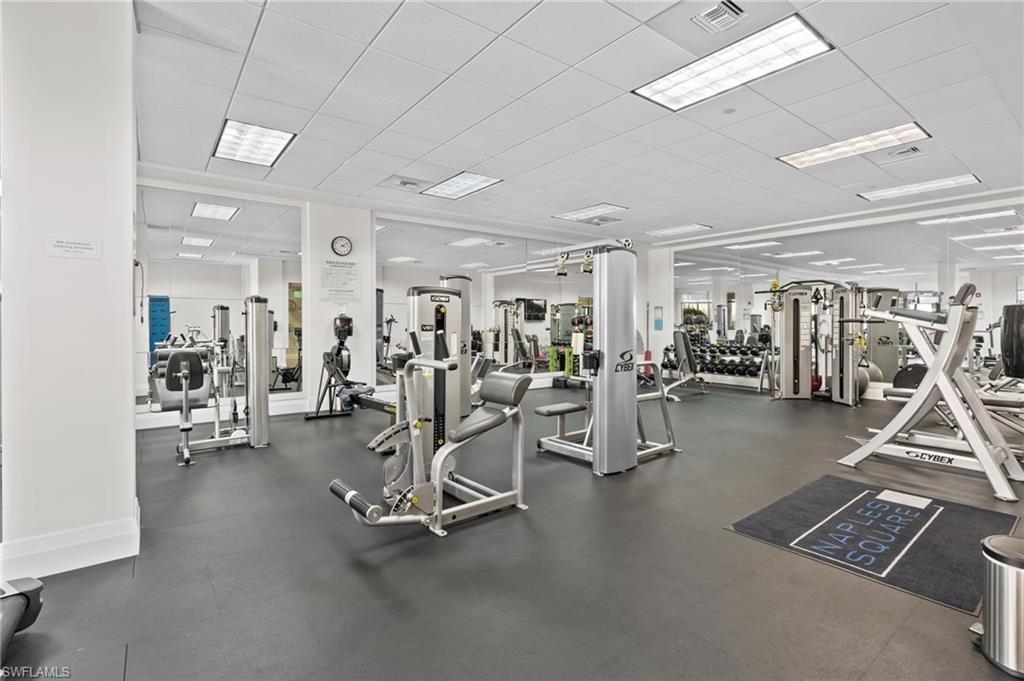 1030 3rd Avenue South, Unit 319 Naples, FL 34102 - Photo 31 of 42 a view of a room with gym equipment