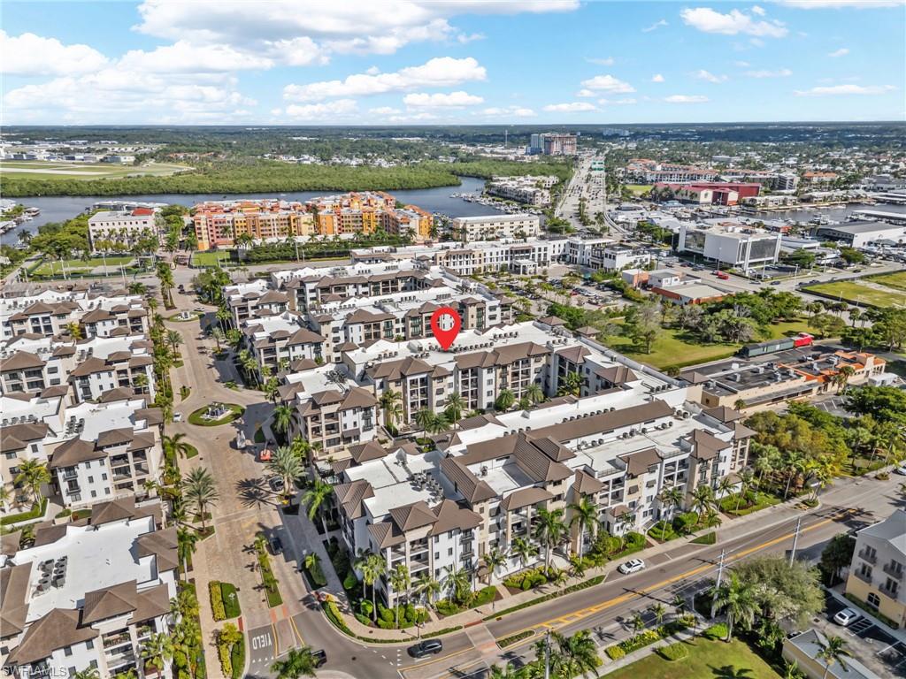1030 3rd Avenue South, Unit 319 Naples, FL 34102 - Photo 40 of 42 a view of a city with an ocean