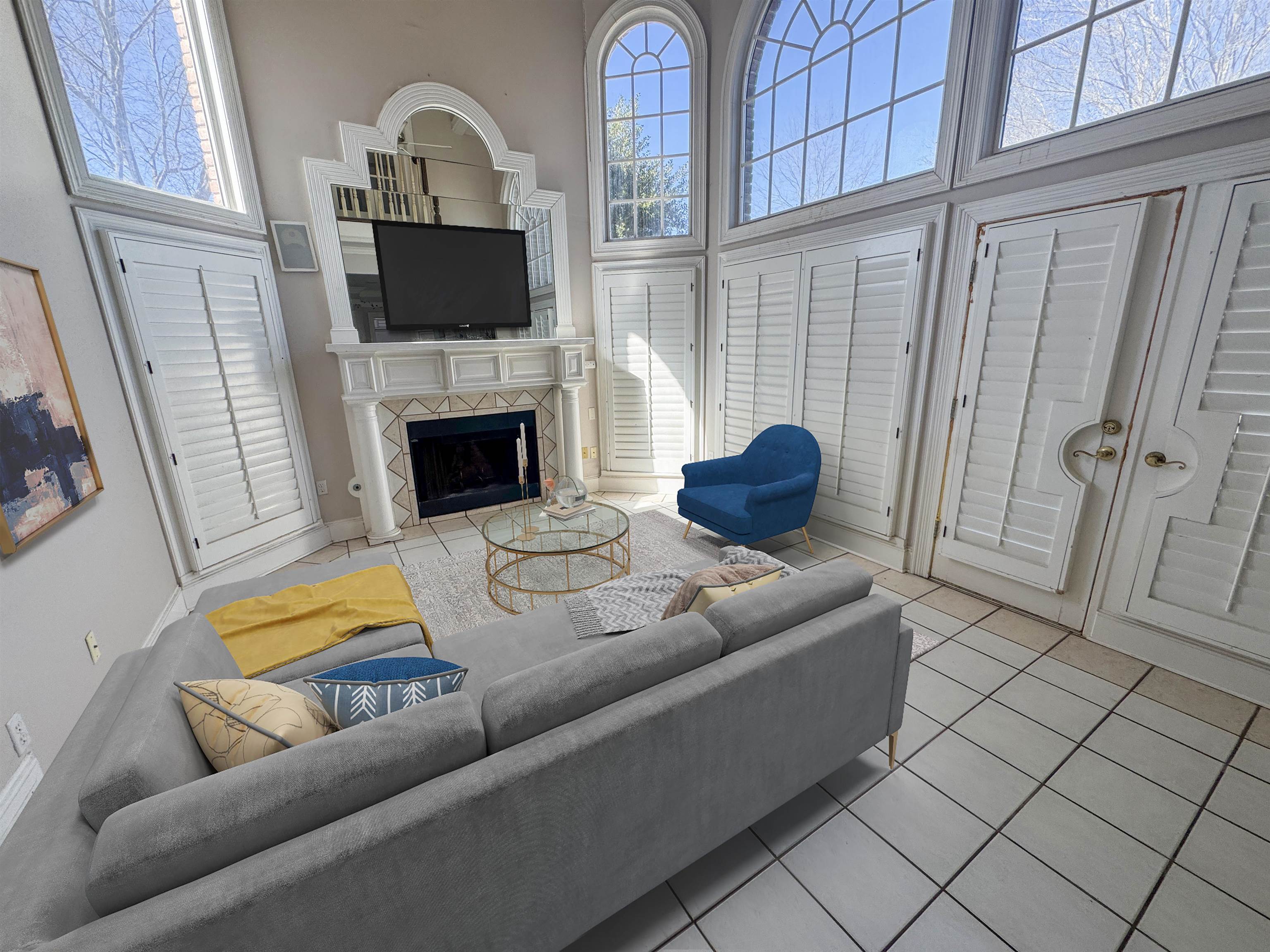 9500 Plantation Lake Road Collierville, TN 38017 - Photo 30 of 40 Living area featuring a high ceiling, tile patterned flooring, and a tile fireplace