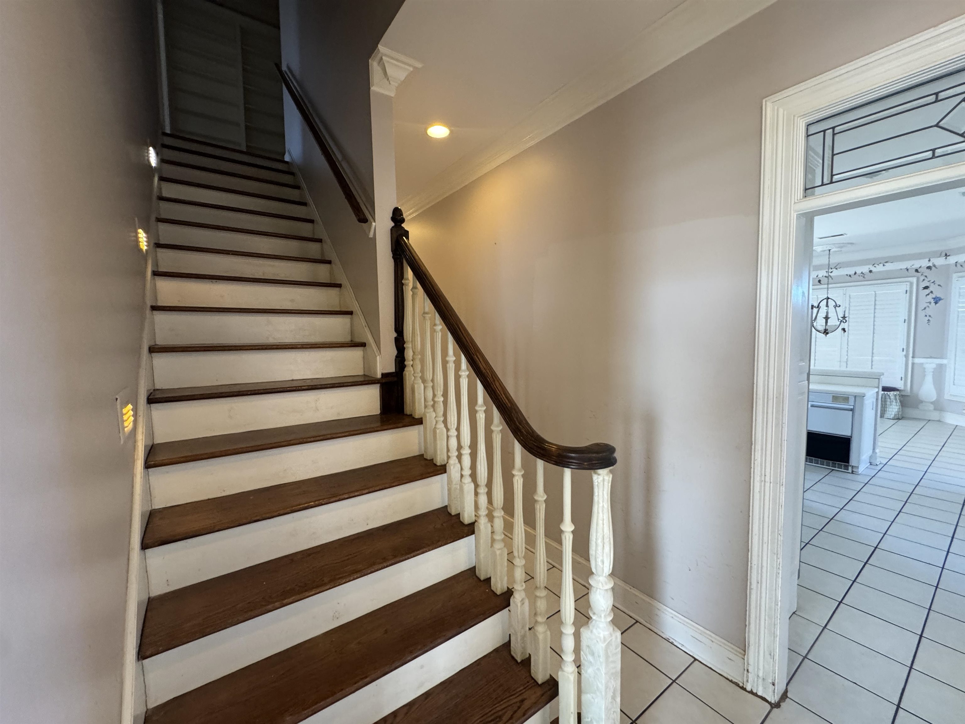9500 Plantation Lake Road Collierville, TN 38017 - Photo 36 of 40 Stairway featuring crown molding, tile patterned floors, recessed lighting, and baseboards