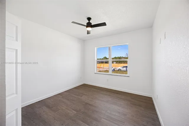 an empty room with window