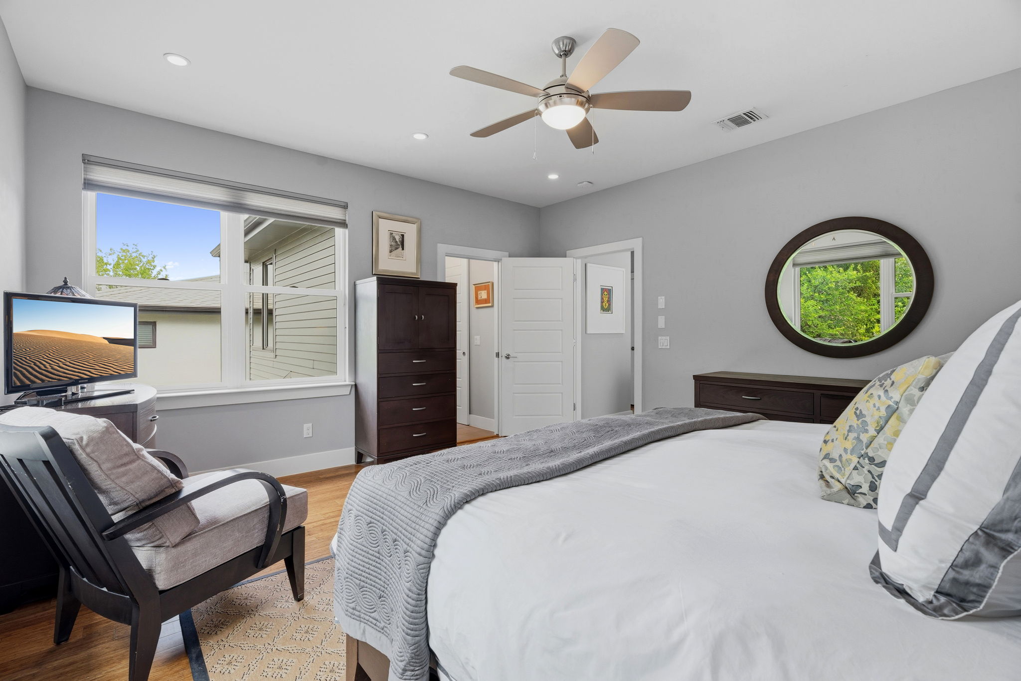 1303 Azie Morton Road, Unit 2 Austin, TX 78704 - Photo 19 of 36 a bedroom with a bed and dresser
