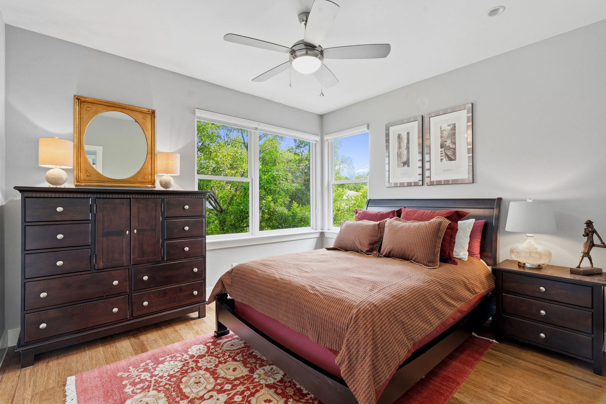 1303 Azie Morton Road, Unit 2 Austin, TX 78704 - Photo 23 of 36 a bedroom with a bed and a dresser