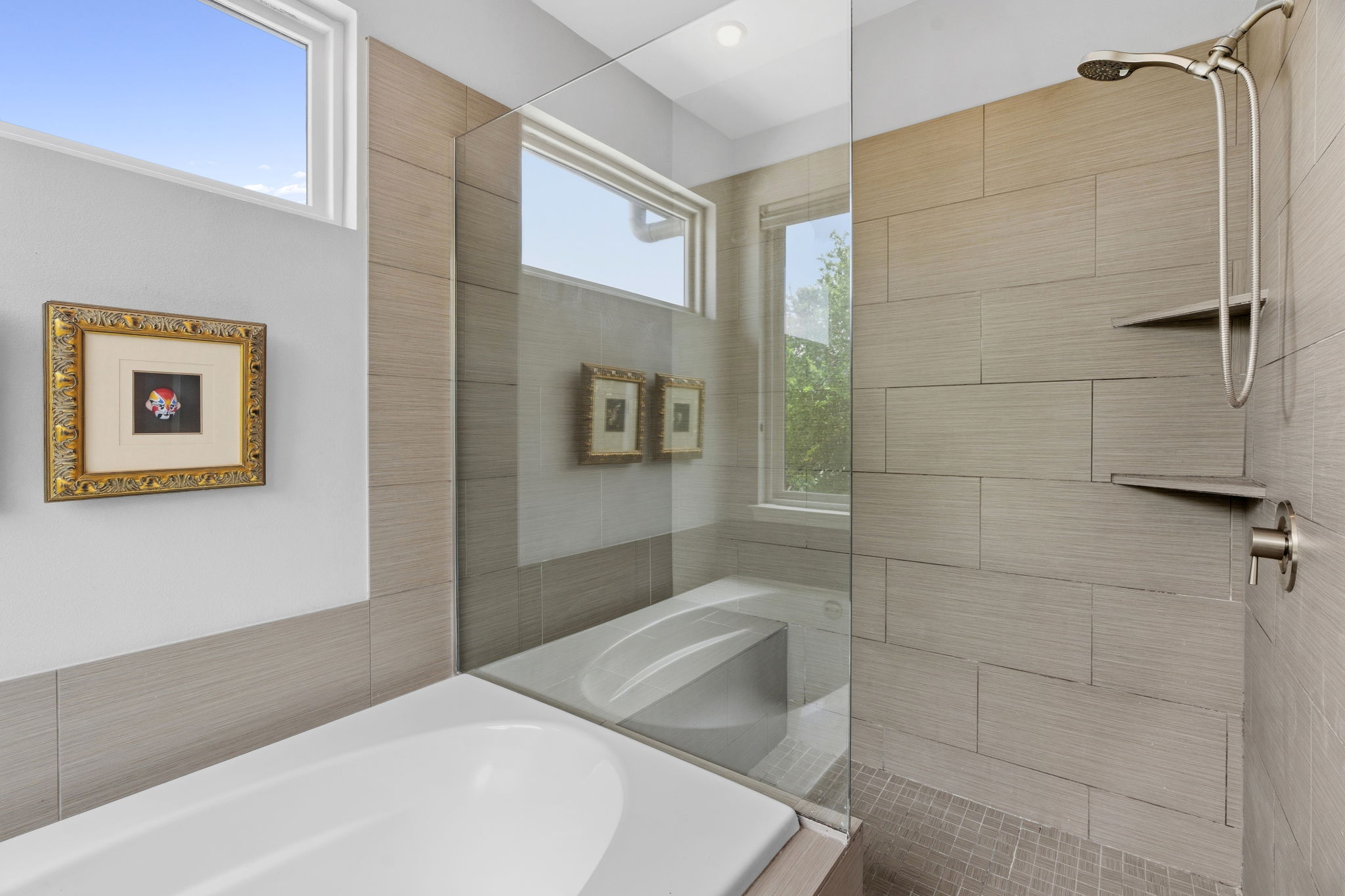 1303 Azie Morton Road, Unit 2 Austin, TX 78704 - Photo 24 of 37 Glass-enclosed shower sits adjacent to the soaking tub, offering a streamlined layout.